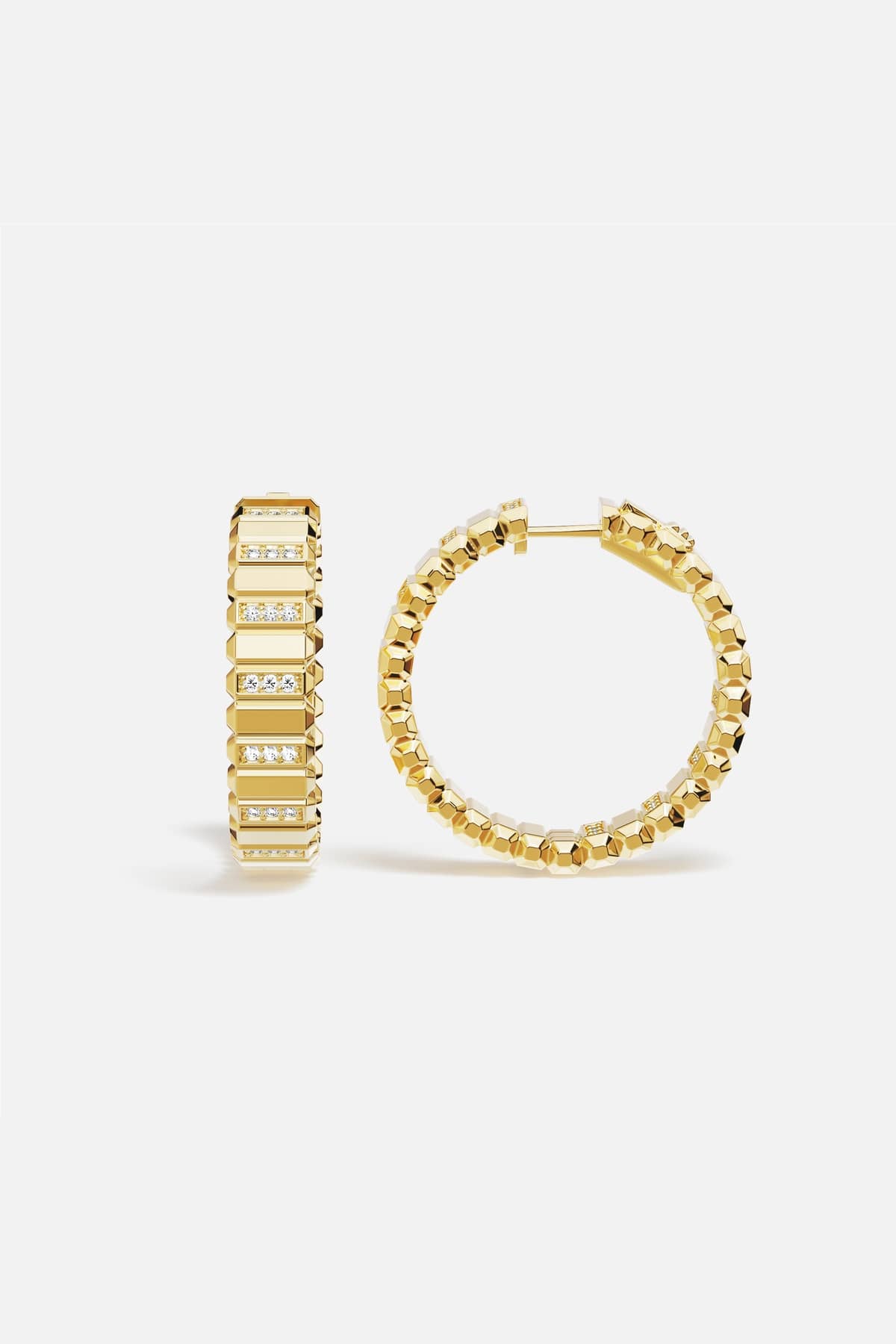 APM Hoop Earrings in golden color, faceted brilliance with a bold modern edge.