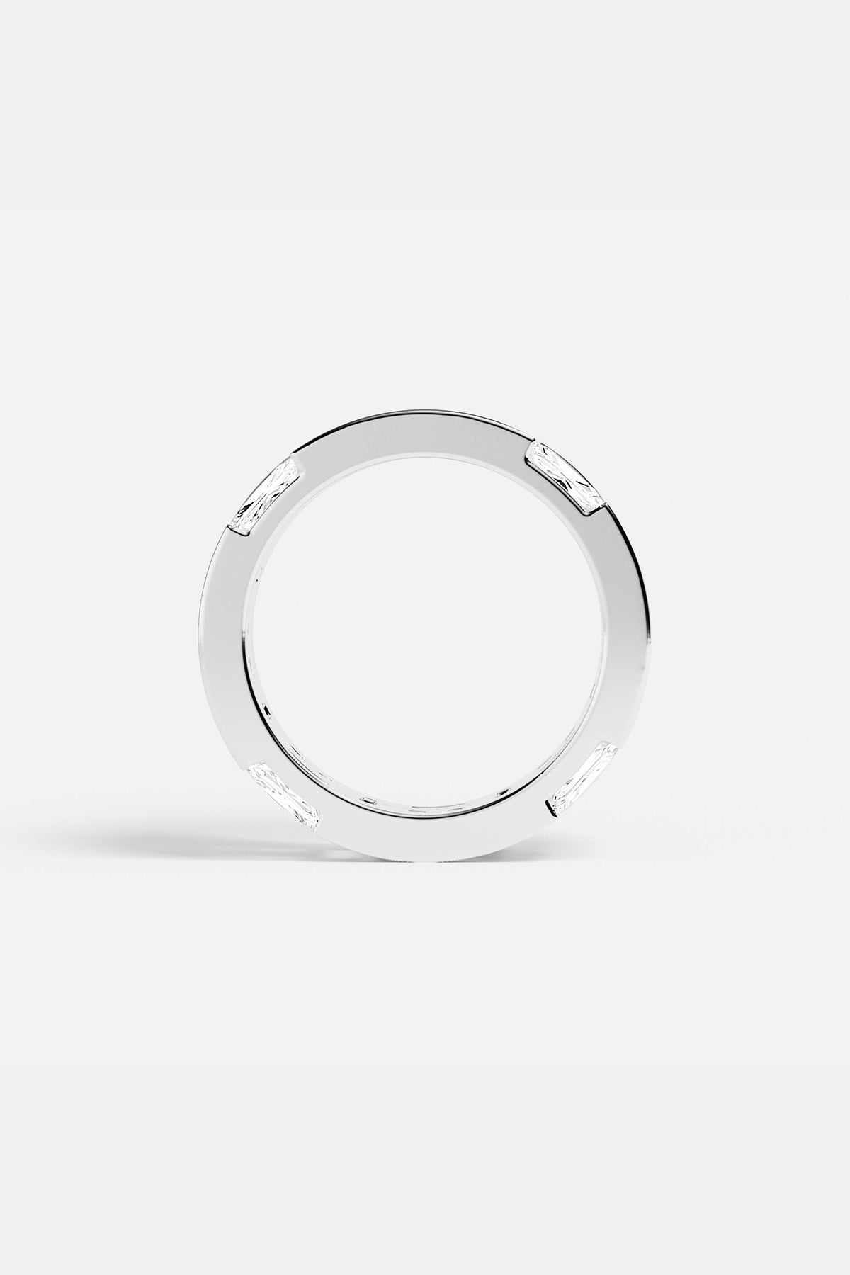 APM Ring in rhodium finish, sleek architectural lines with a quiet modern glow.
