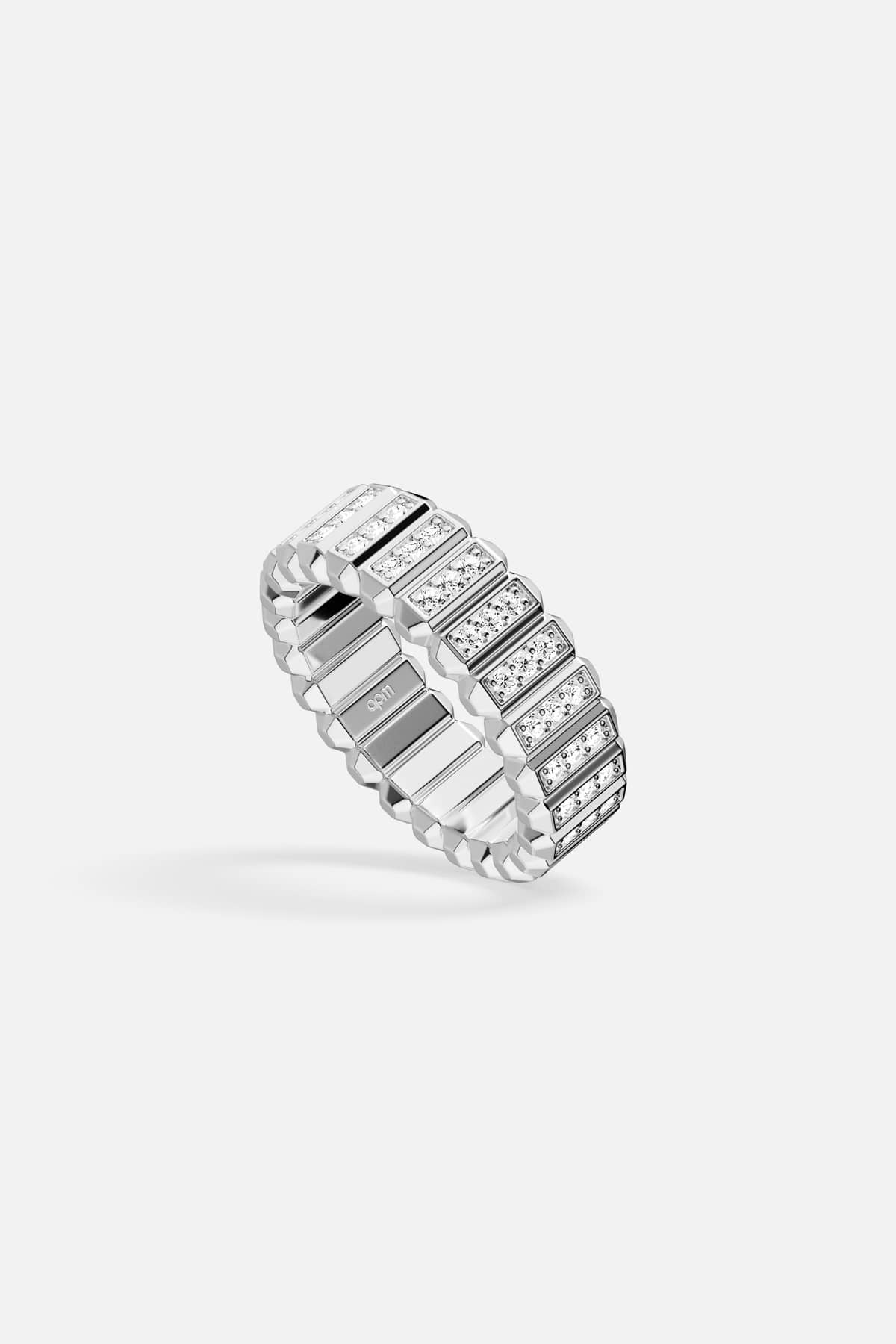 APM Ring in rhodium finish, architectural lines meeting subtle sparkle for effortless modernity.