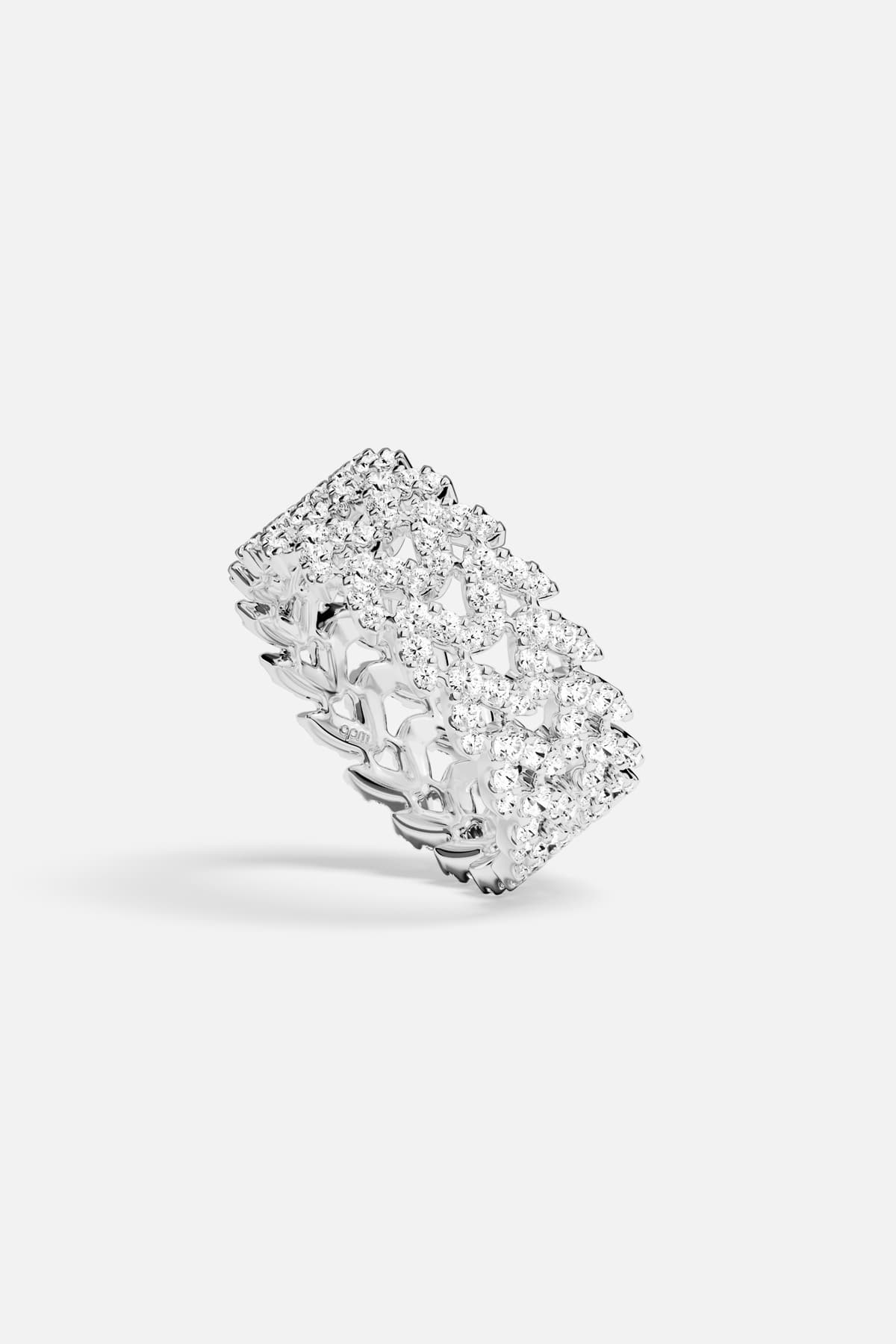APM Ring in rhodium finish, a shimmering lace of light around the finger.