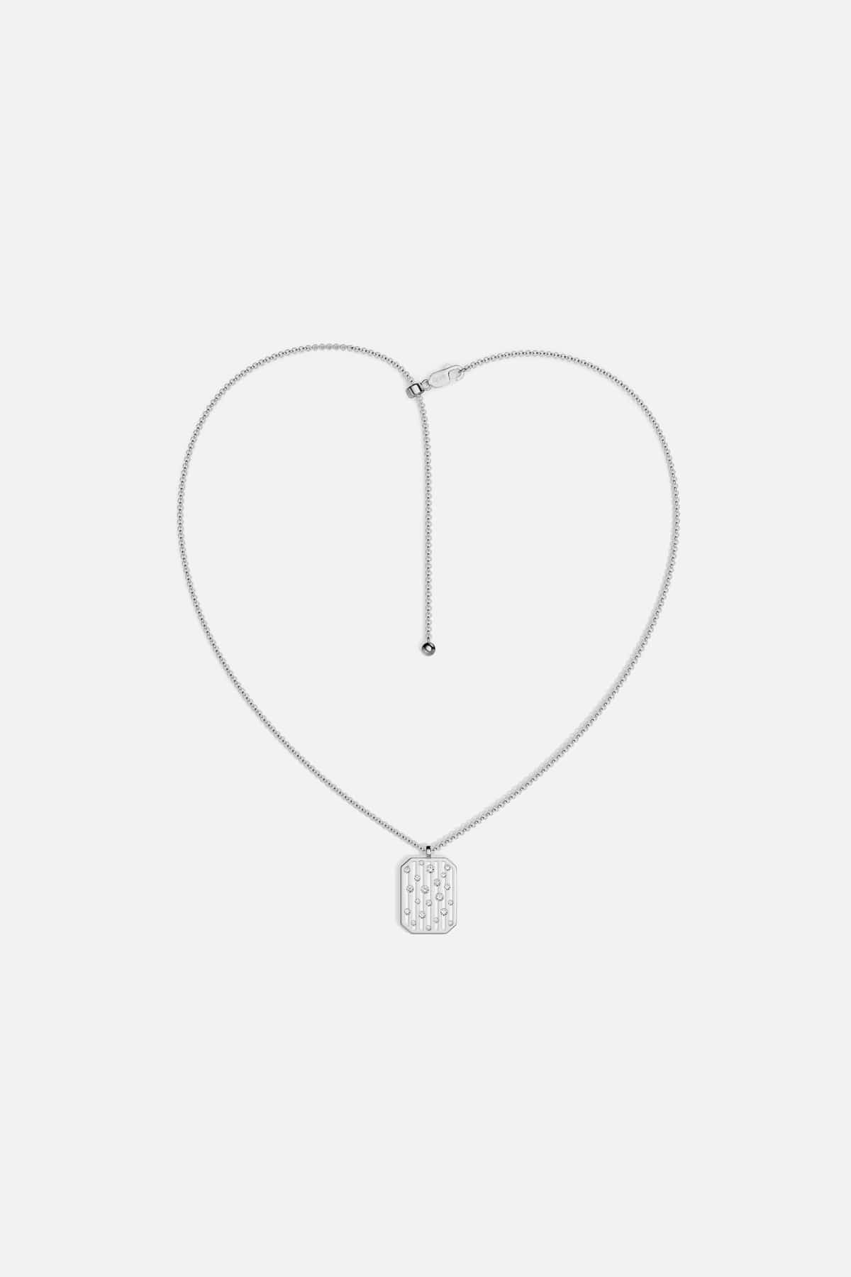 APM Monaco pendant necklace in rhodium finish, a whisper of modern elegance.