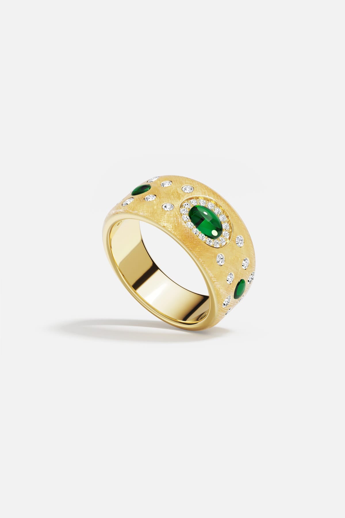 APM Ring in brushed gold color, scattered with emerald hues and starlit sparkle.