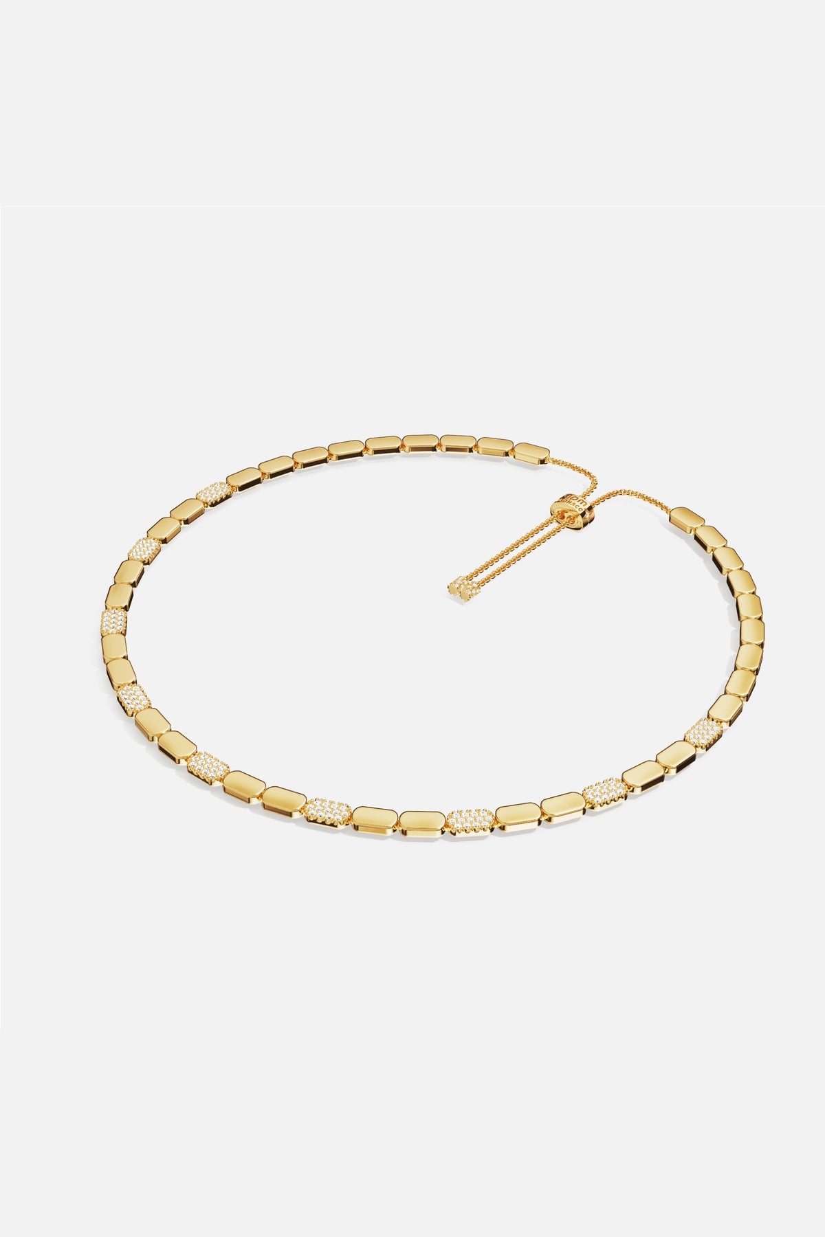 APM Necklace in golden color, a sleek rhythm of shine and sparkle.