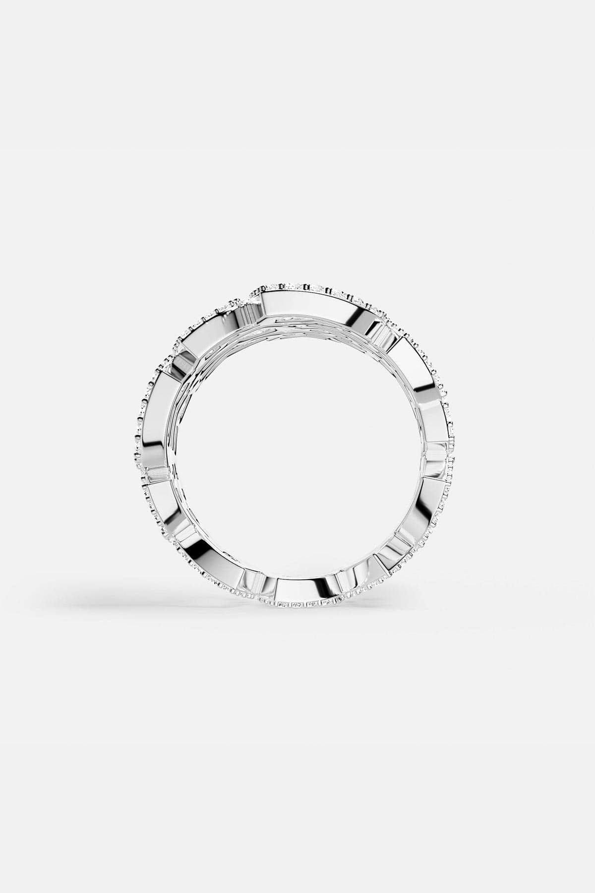 APM MONACO heart-shaped silver earring on a white background