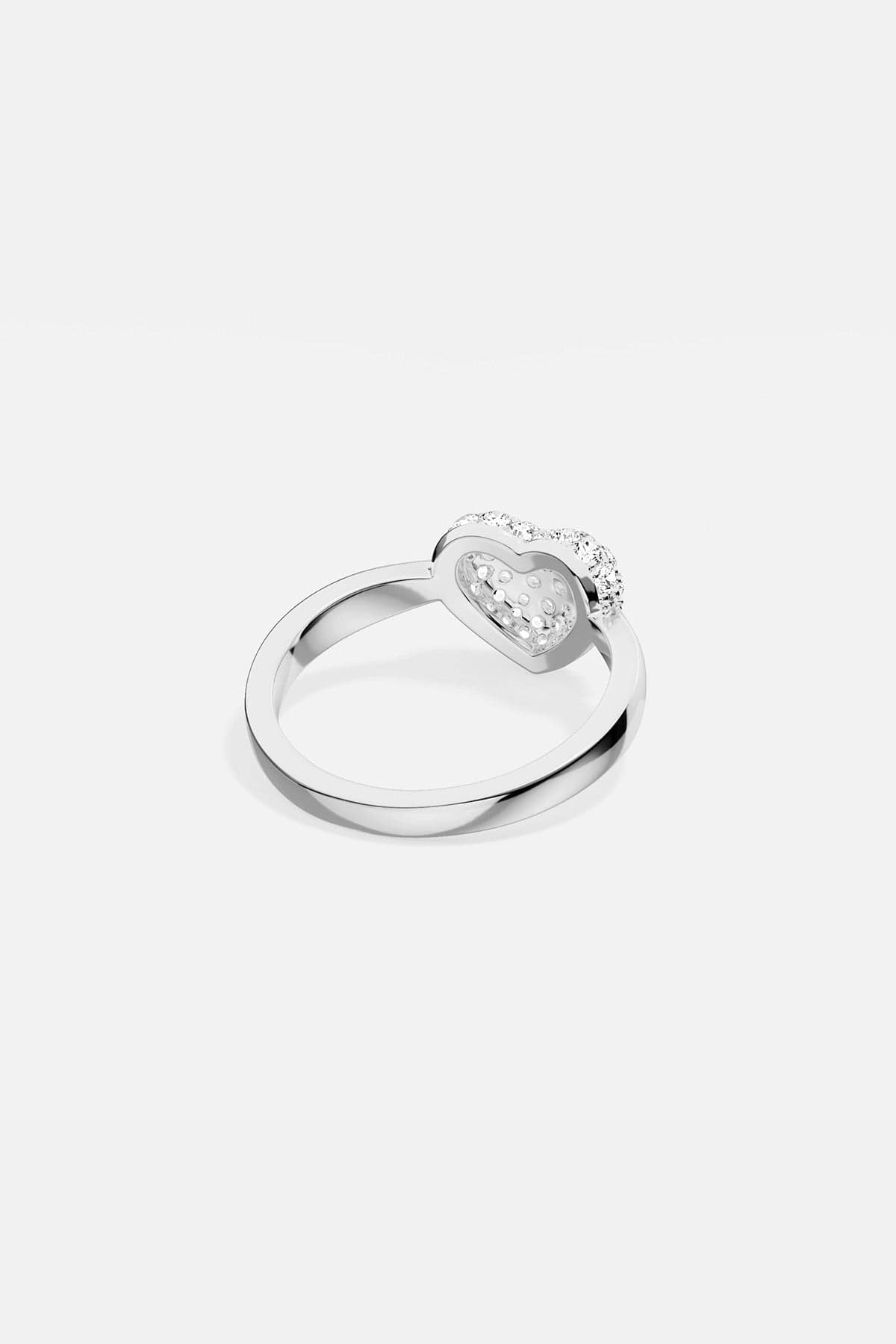 APM MONACO silver ring with a heart-shaped stones on a white background