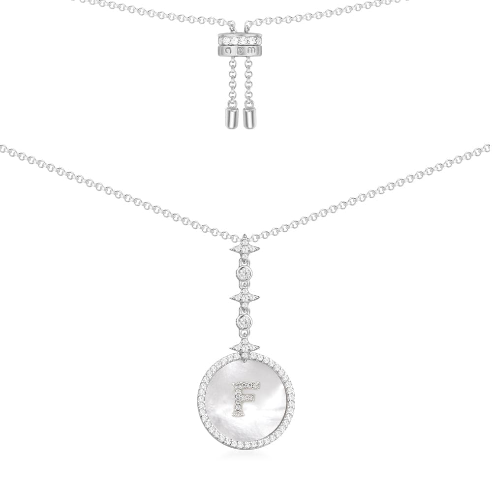Necklaces APM Monaco: Pendant necklace featuring a white mother-of-pearl F initial set in a round bezel, suspended from a silver chain.
