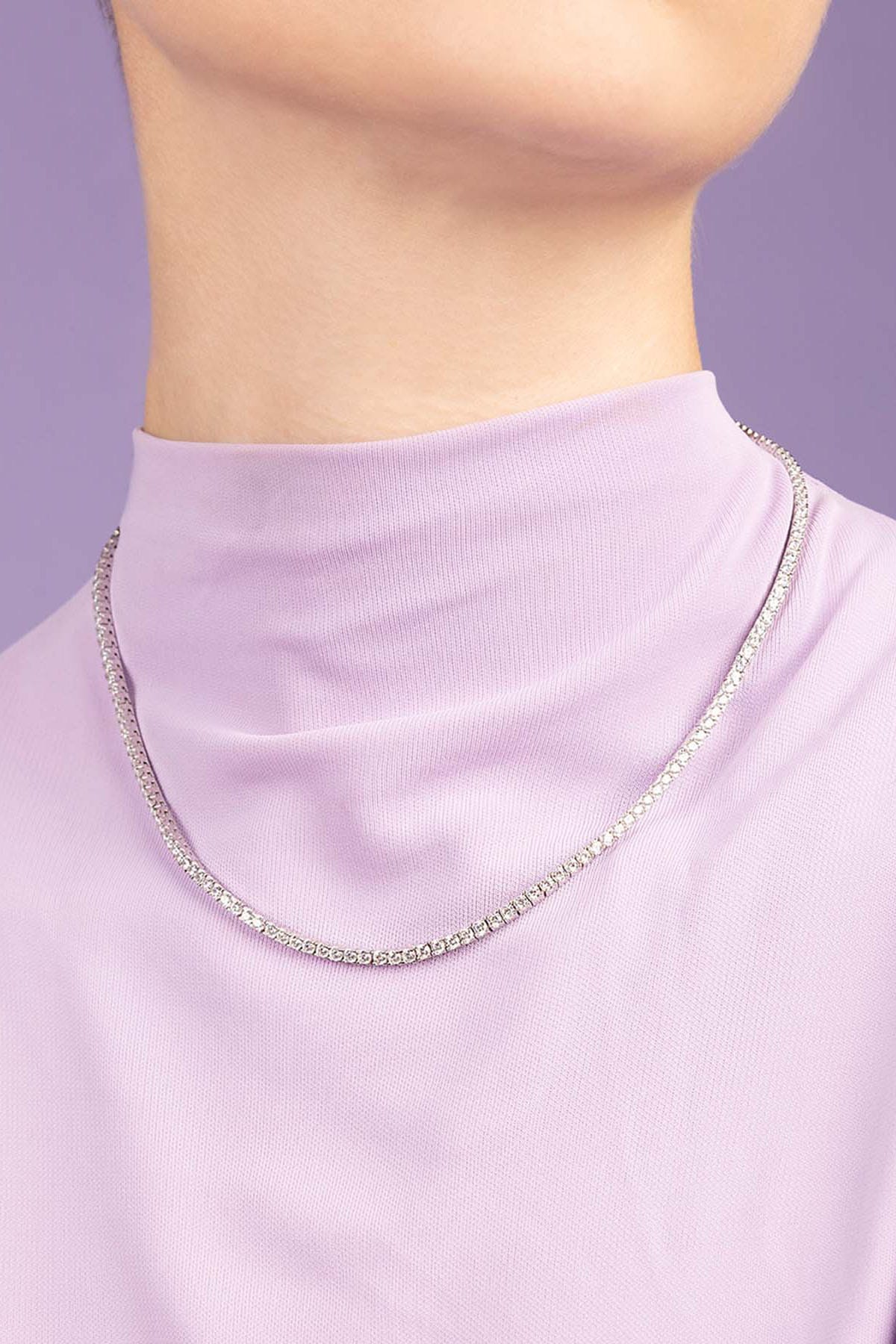 APM Monaco Pave Choker worn on model with lilac background