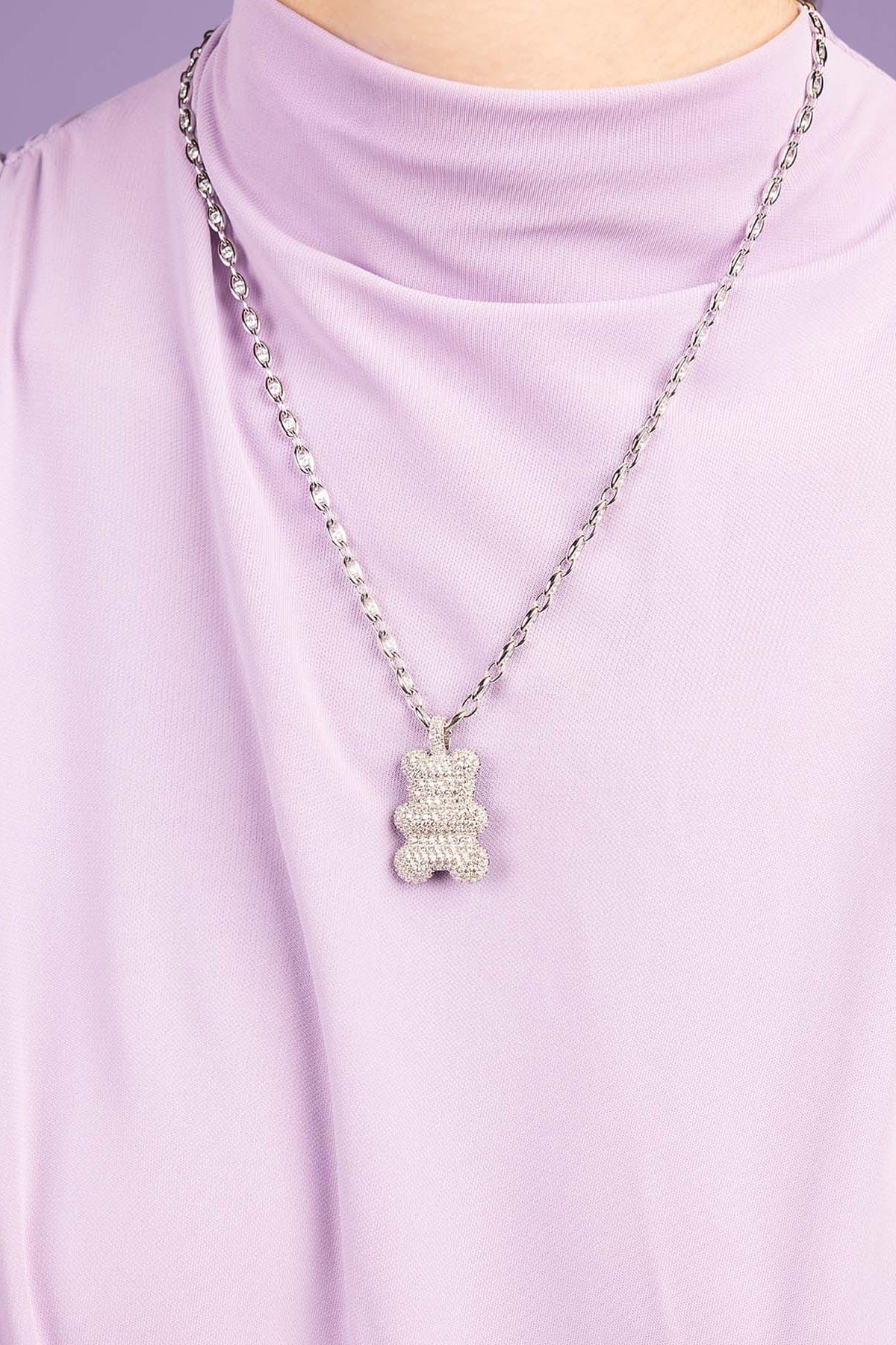 APM Monaco XL Baba Yummy Bear Adjustable Necklace worn on model with lilac background