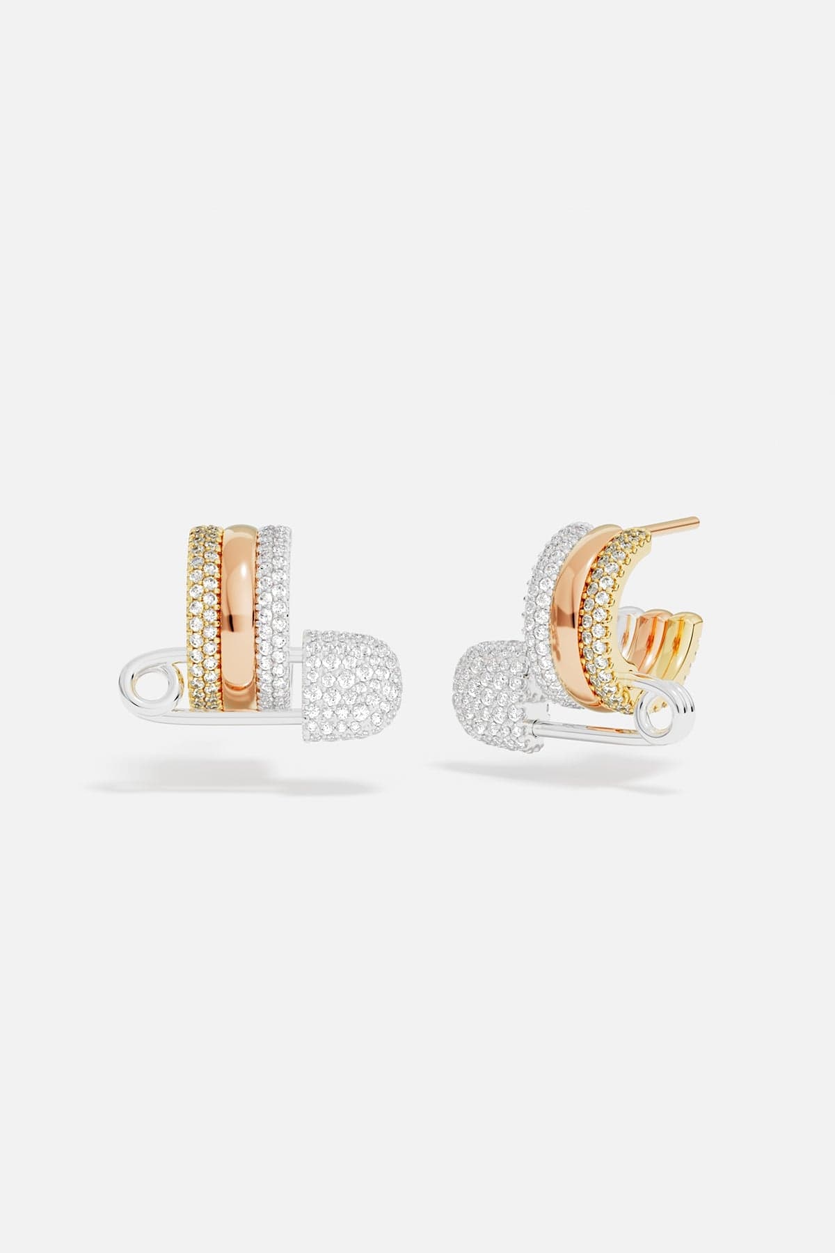 Earrings APM Monaco two safety-pin hoop earrings in rose gold and white gold with multicolor accents.