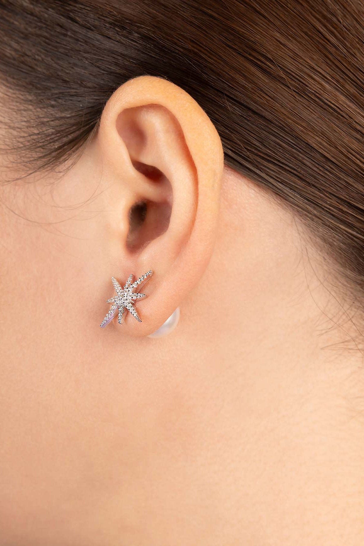 APM Monaco Meteorites Silver Stud with pearl Earring worn on model with lilac background