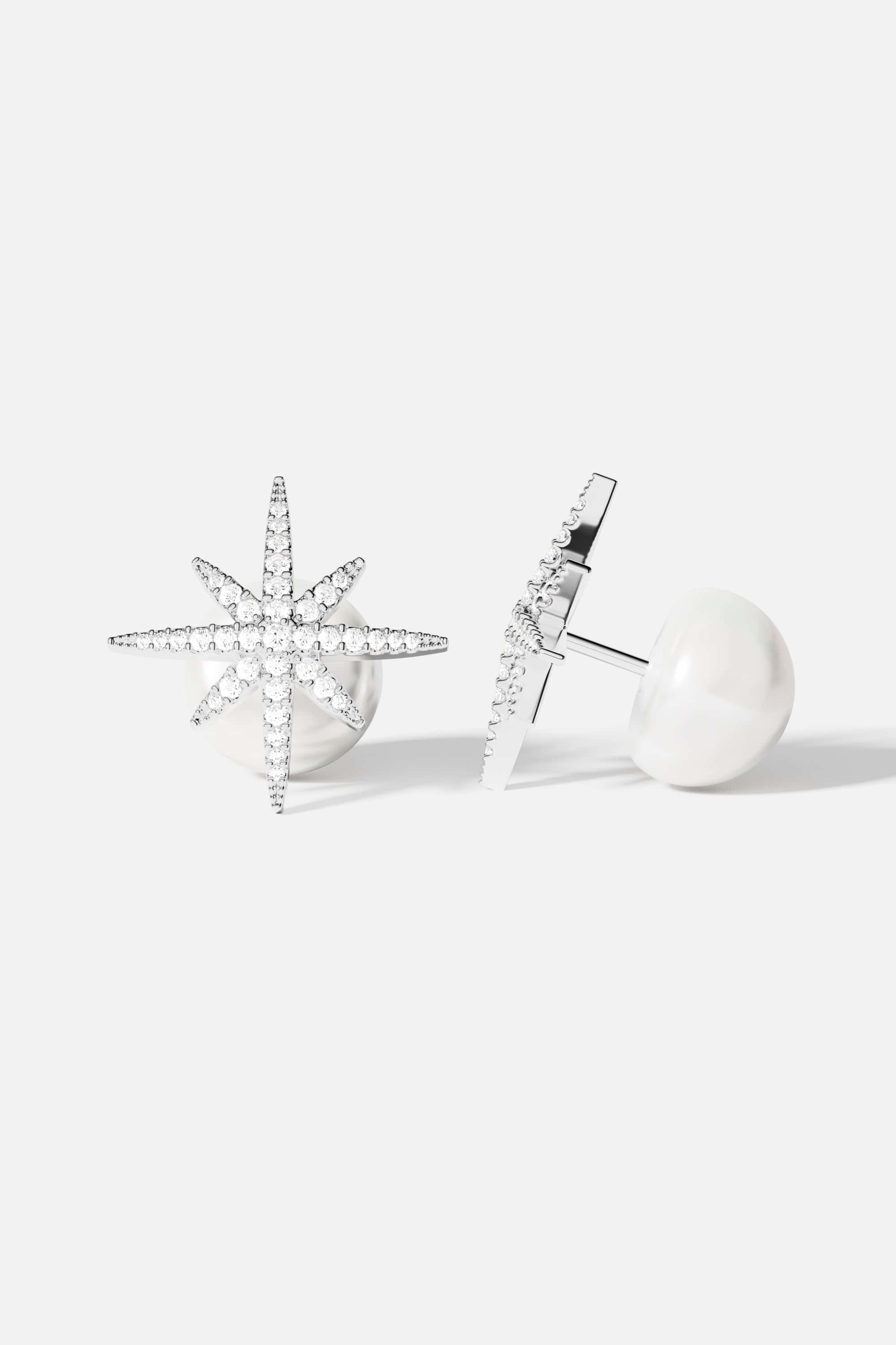 Earrings APM Monaco starburst meteorite-inspired stud with a white pearl, white metal finish.