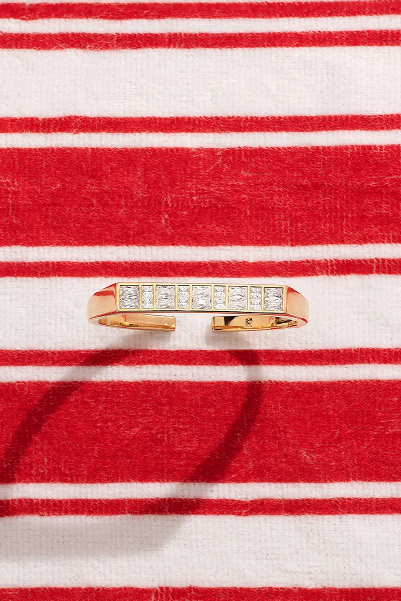 APM Monaco Yellow Reflets Bracelet on a red and white background