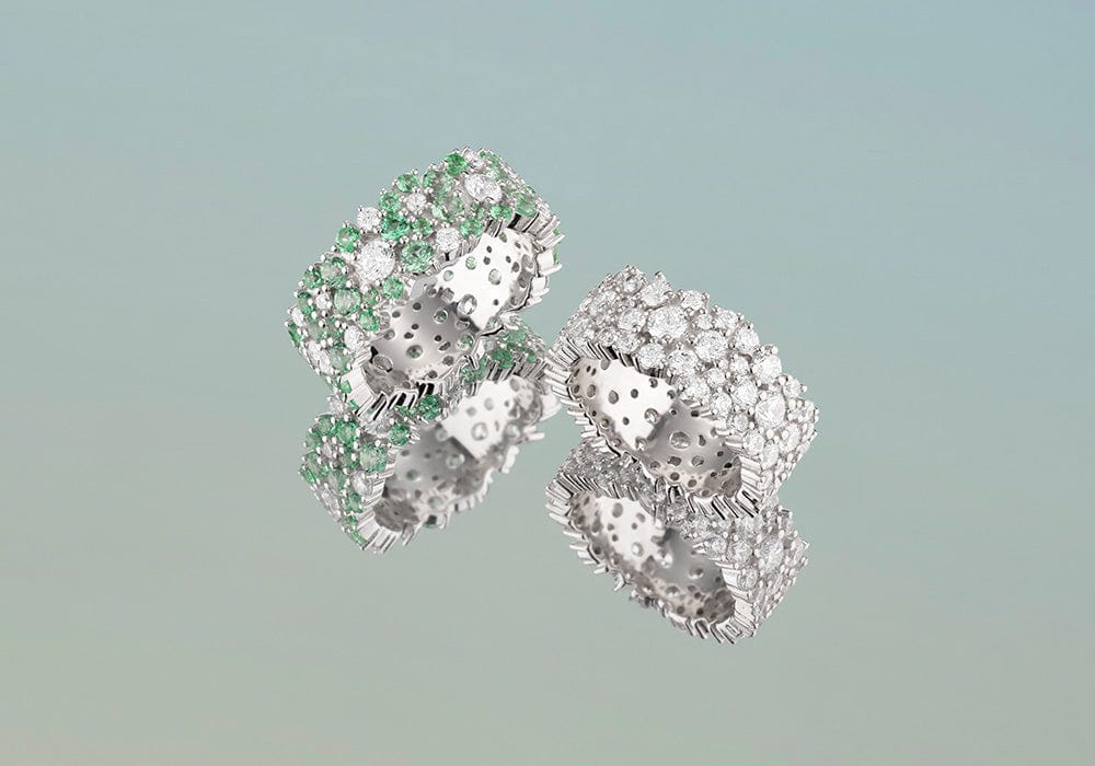 APM Monaco Festival Drop Bold Rings on pastel blue background