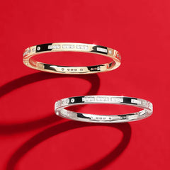 APM Monaco Yellow and White Morse Code Bangles choker on a red background