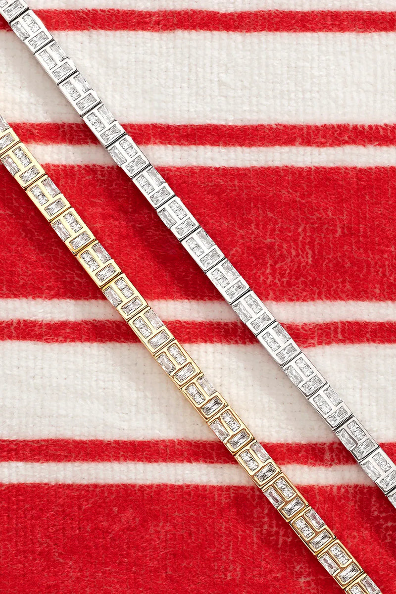 APM Monaco Yellow and White Ice Bracelet on a red and white background