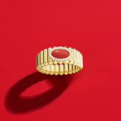 APM Monaco Yellow Les Calanques rings on a red background