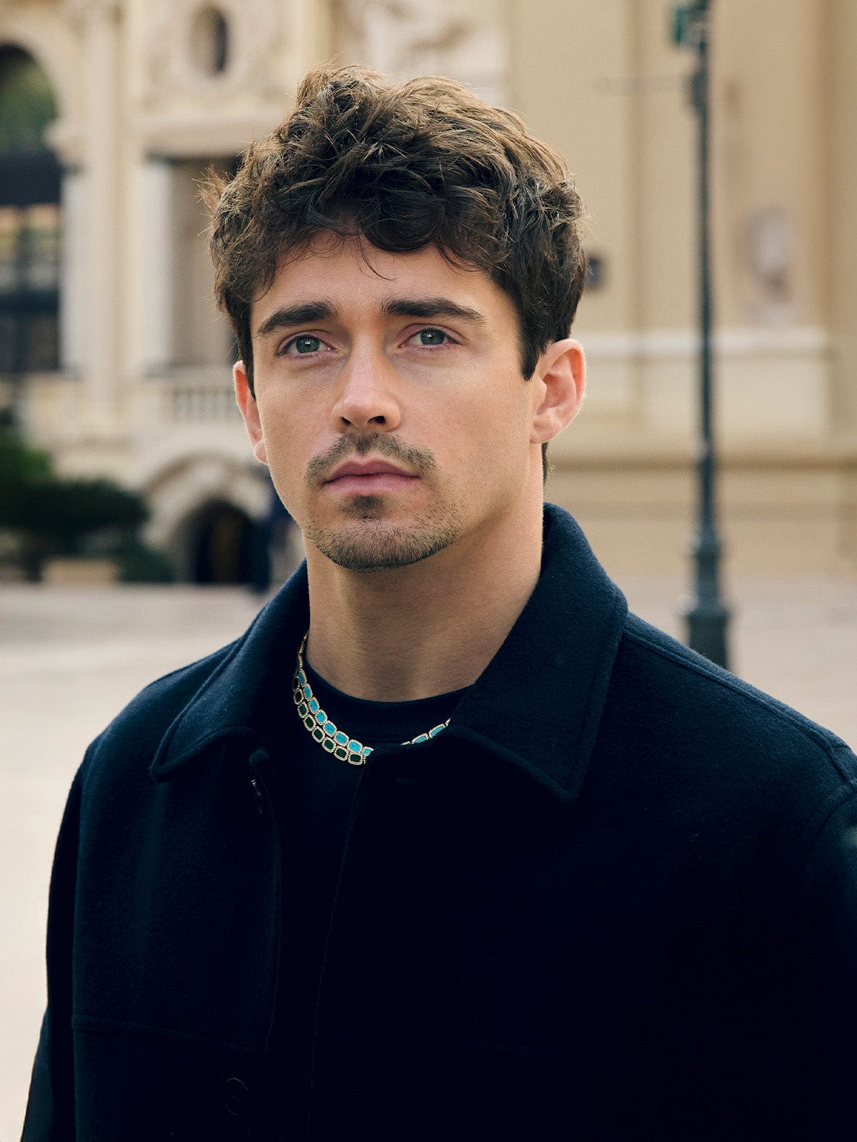 APM Monaco Collection Mediterrane Charles Leclerc wearing malachite and lagoon chokers