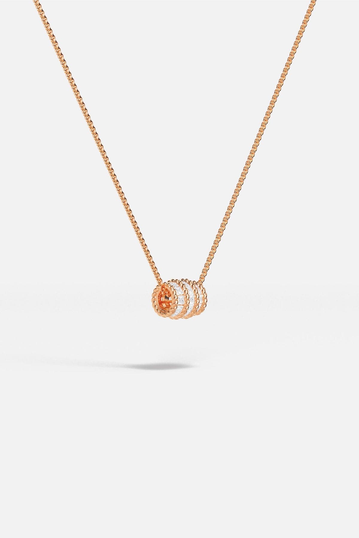 APM MONACO Torsade Adjustable necklace in rose gold on white background