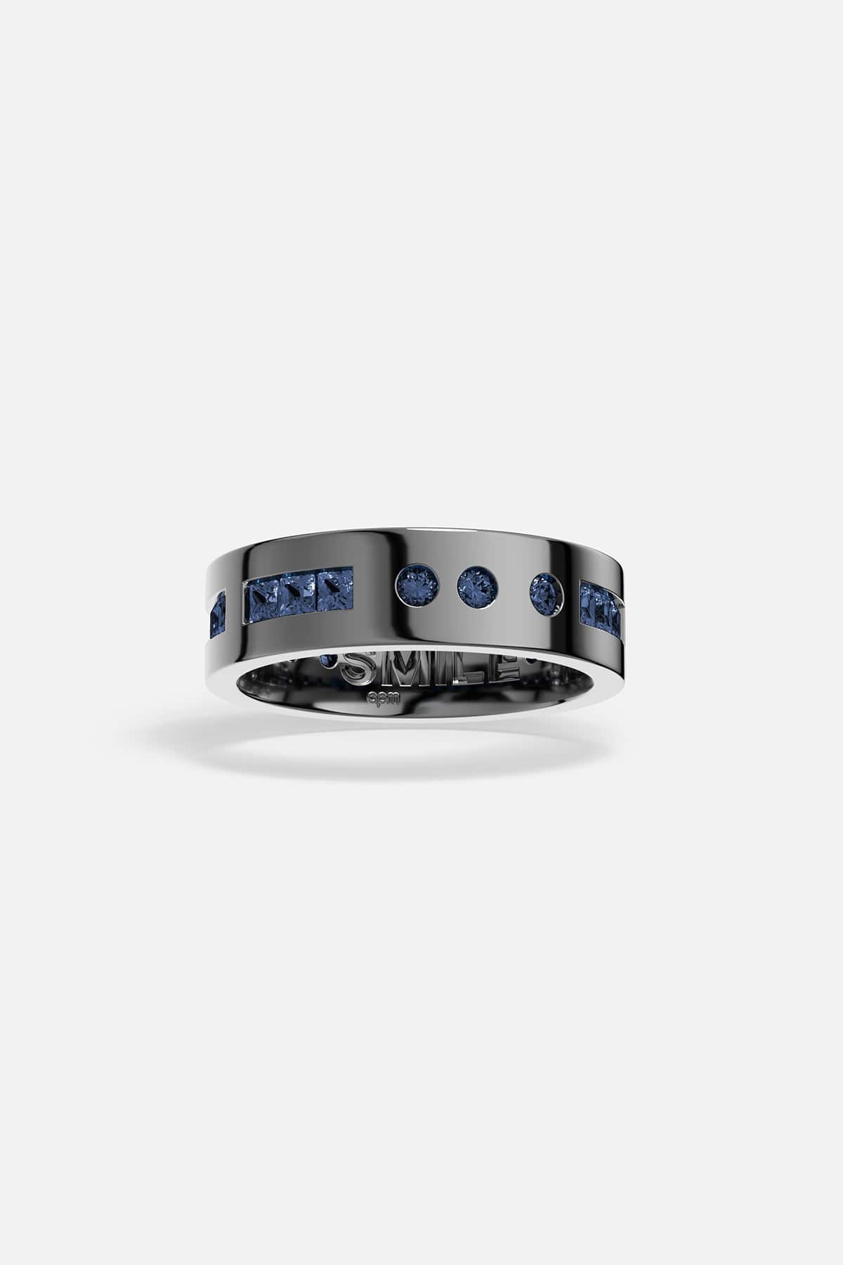 alloy ring with blue gemstones on a white background