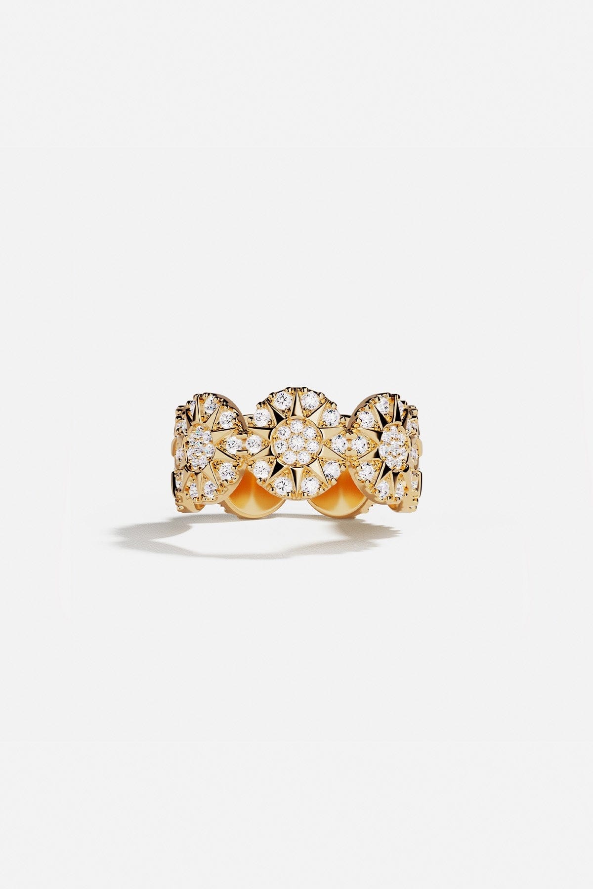 Ring, APM Monaco, yellow gold sunburst design with a starburst motif; statement style with no visible stones.
